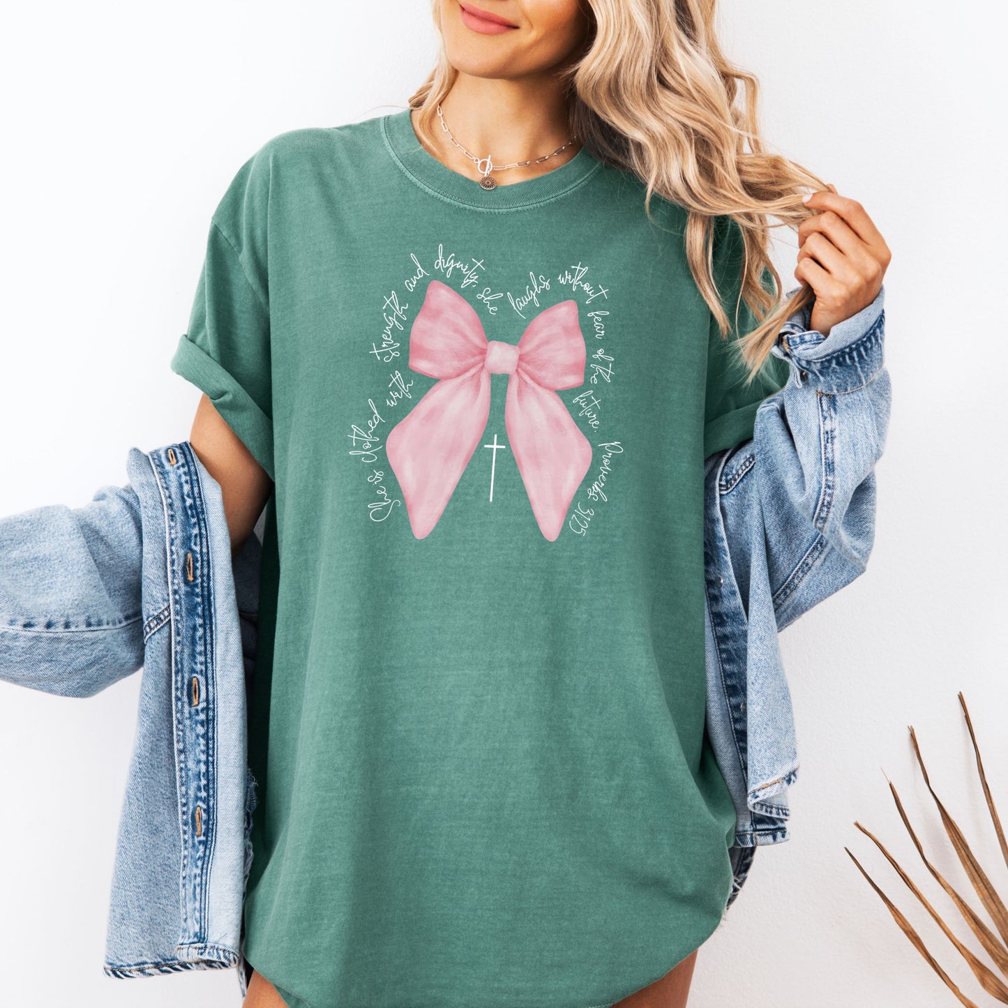 Christian Pink  Bow Bible Verse Faith Shirt, She is Clothed with Strength and Dignity Tee - Proverbs 31:25 Coquette Bow T-Shirt