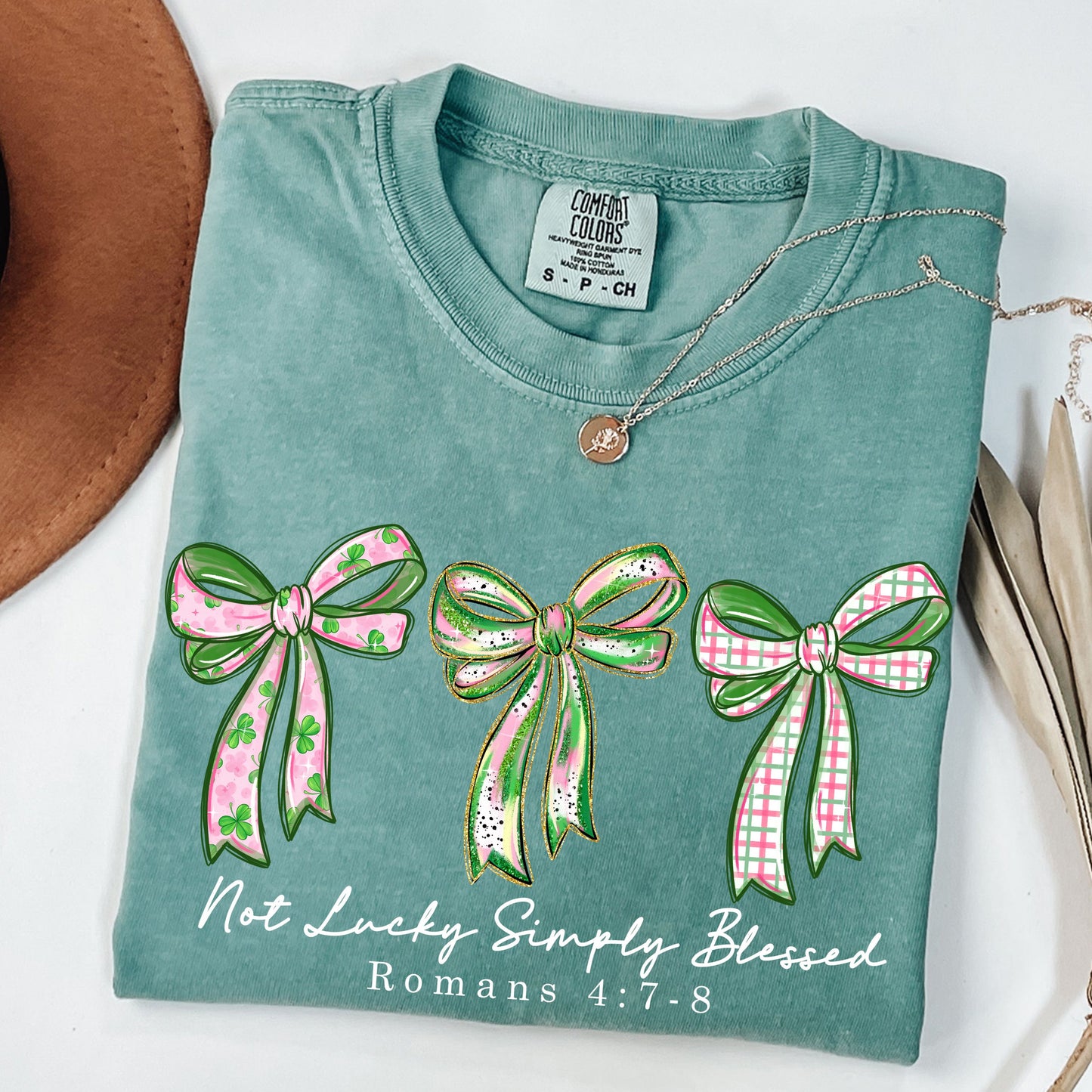 Not Lucky Simply Blessed Shirt, Christian St Patrick’s Day Tee, Romans 4:7-8 Bible Verse Shirt, Faith Bow Graphic Tee, Lucky Charm T-Shirt