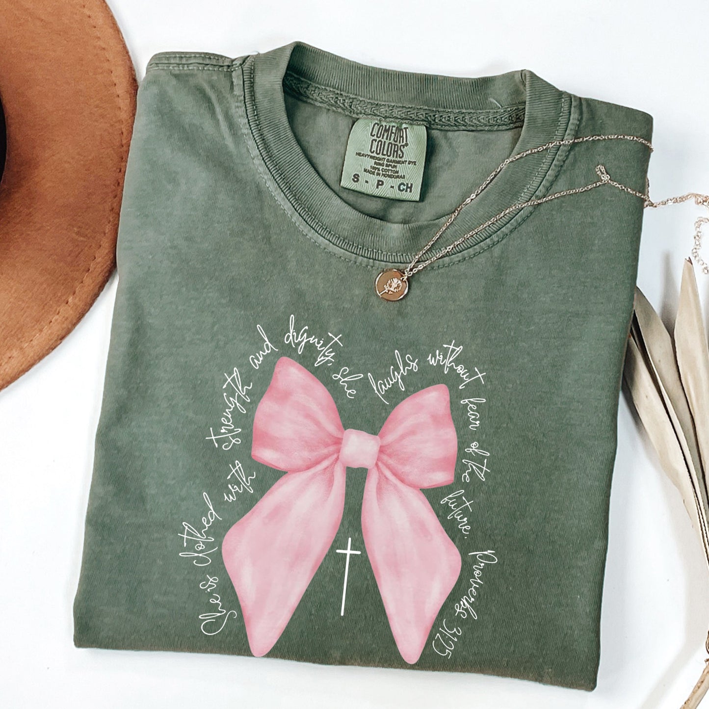 Christian Pink  Bow Bible Verse Faith Shirt, She is Clothed with Strength and Dignity Tee - Proverbs 31:25 Coquette Bow T-Shirt