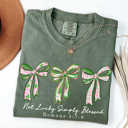 Not Lucky Simply Blessed Shirt, Christian St Patrick’s Day Tee, Romans 4:7-8 Bible Verse Shirt, Faith Bow Graphic Tee, Lucky Charm T-Shirt